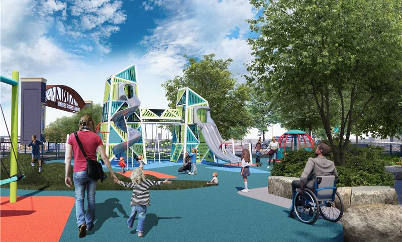 People entering an inclusive play area